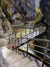 Metal walkways lead through the gorge of the Almbachklamm