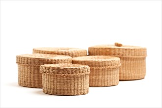 Various sized wicker baskets isolated on white
