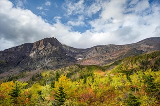 View of Rising Wolf Mountain and bushes in fall colors