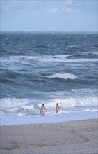 Nude bathers at a nudist beach