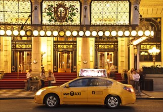 Yellow cab parked in front of the Plaza Hotel, 5th Avenue, New York City
