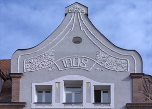 Art Nouveau relief on the gable of a residential house
