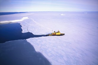 Russian Icebreaker Kapitan Khlebnikov making its way in the frozen sea near Atka Iceport or Atka Bay