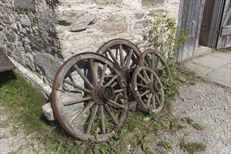 Old wooden wheels of carts