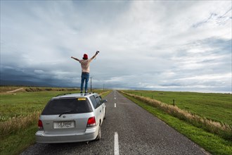 Guy on car roof