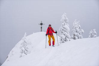 Young woman on ski tour