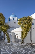 Blue and white Greek Orthodox Church in the old town of Parikia
