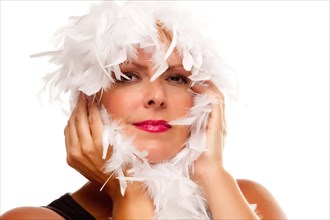 Pretty girl with white boa isolated on a white background