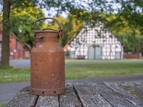 Old milk can in the village center of the Rundlingsdorf Luebeln