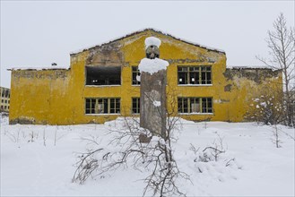 Destroyed Lenin statue in the abandoned mining city Kadykchan