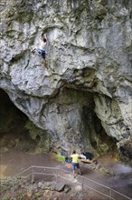 Climber at rock face in Riesenburg cave