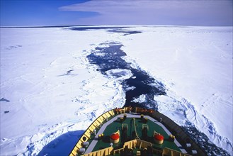 Russian Icebreaker Kapitan Khlebnikov making its way in the frozen sea near Atka Iceport or Atka Bay