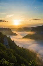 View from Eichfelsen to Werenwag Castle with morning fog