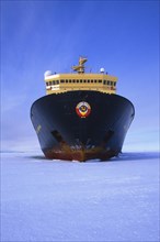Russian Icebreaker Kapitan Khlebnikov parked in the frozen sea at Atka Iceport or Atka Bay