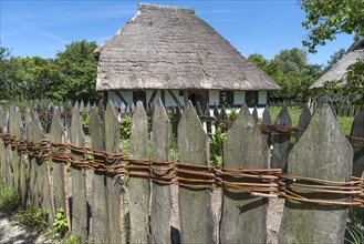 Wooden fence connected with willow rods