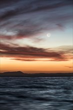 Moon at sunset at Lake Taupo
