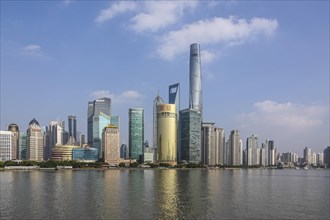 View over the Huangpu River to the skyline of the special economic zone Pudong with the skyscrapers Jin MaoTower