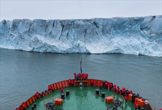 Icebreaker apporaching a massive glacier on Mc Clintok or Klintok Island