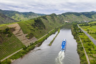 River cruise ship on the Moselle river bend at Bremm