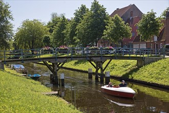 Bridge over the central canal Mittelburggraben with pedal boat
