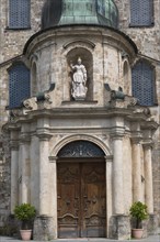 Entrance gate with statue of the Virgin Mary