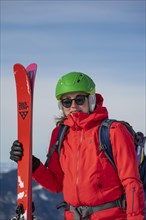 Young woman with ski