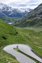 Road cyclist on the south side of the Spluegen Pass