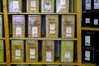 Various teas in tins on shelf