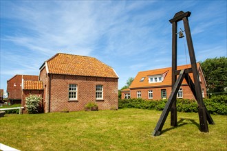 Old protestant island church with external church bell