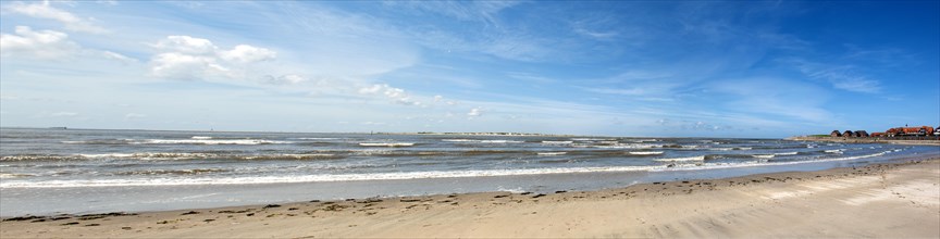 Panoramic view of the sandy beach at the harbour of the island Baltrum