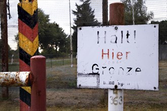 Sign Halt! Here border post post post post post