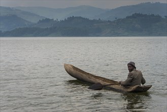 Local in a dugout canoe