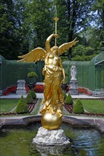 Golden fountain figure of the goddess of fate Fama