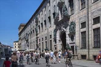 West front of the Residenz with Residenzstrasse and cyclists