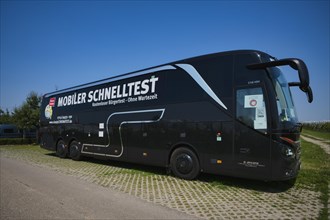 Mobile rapid test centre in coach