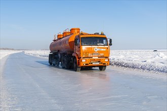 Truck on a Ice road on the frozen Lena river