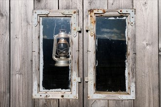 Window and oil lamp