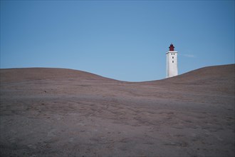 Dunes and lighthouse