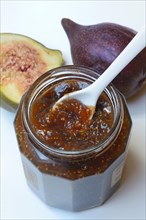 Fig jam in glass and figs