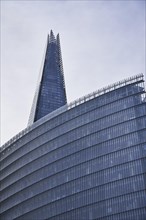 The Shard with glass facade in the foreground