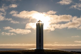 Lighthouse in the backlight