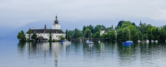 Orth Castle on Lake Traun in Gmunden with boats