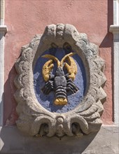 Coat of arms on the historic Haus zum Krebs