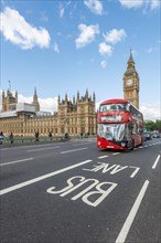 Red double-decker bus on the Westminster Bridge
