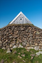 Lonely hut with stone wall