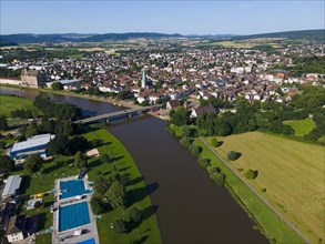 Drone shot of the Weser with outdoor pool and Holzminden