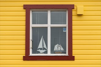 Window with miniature ships