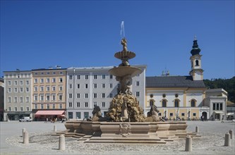 Residenzbrunnen on Residenzplatz with St. Michael's Church