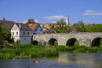 River Woernitz with bridge and old town