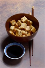 Fried tofu cubes in bowl